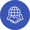 Two people shaking hands over a globe.